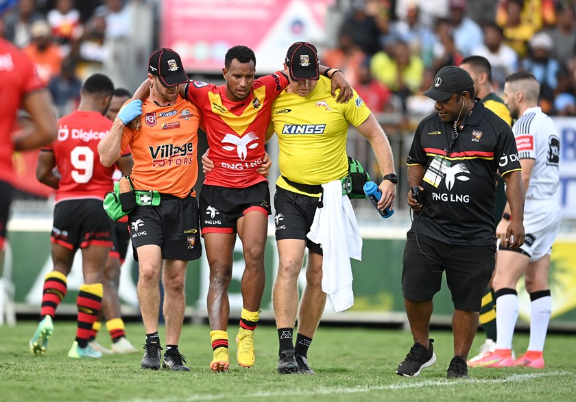 Morea Morea is helped from the field after suffering an ankle injury in the Prime Minister's XIII game in 2023.