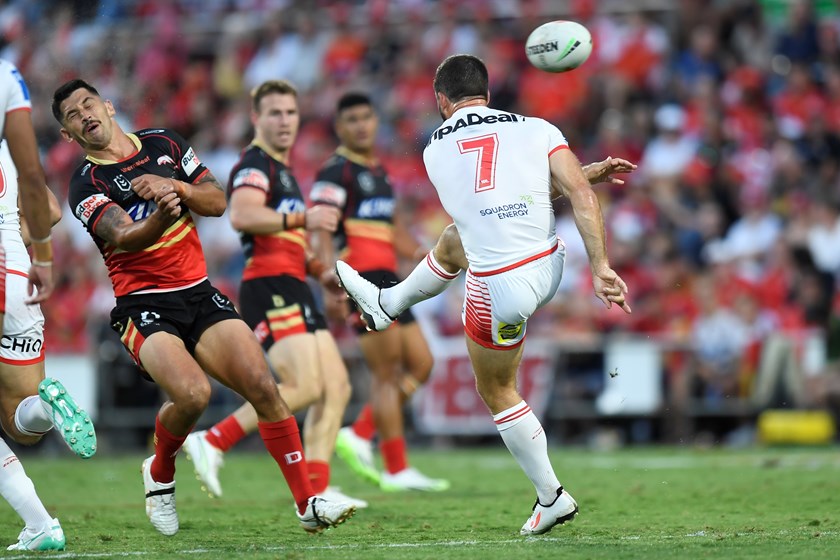 Jeremy Marshall-King cops a ball in the head after attempting to charge down a Ben Hunt kick.