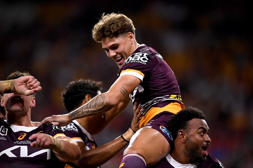 Reeve Walsh celebrates one of Brisbane's tries against Wests Tigers.