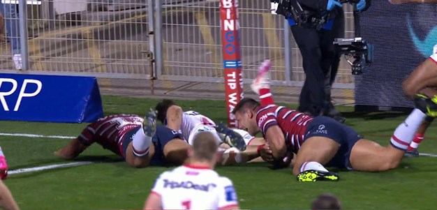 Lomax beats several Roosters to score