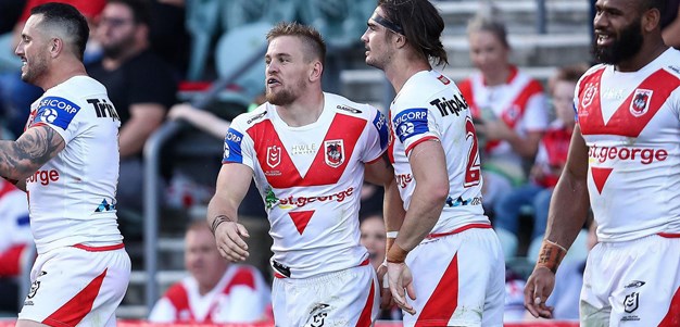 Norman steers Dufty through a hole near the ruck