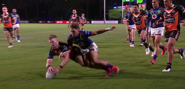 Garner beats Walsh to the ball for the first try