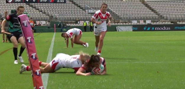 Tonegato with one of the tackles of the season