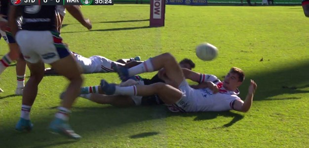 Fletcher Baker makes a big tackle to halt the Warriors