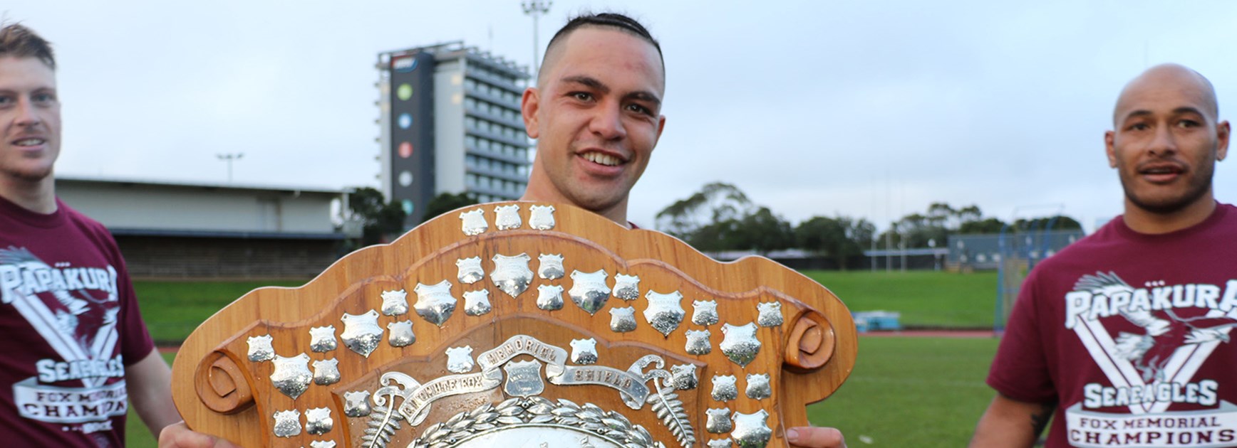 Reece Joyce on Mt Smart Stadium No.2 proudly holding Auckland's Fox Memorial Premiership.