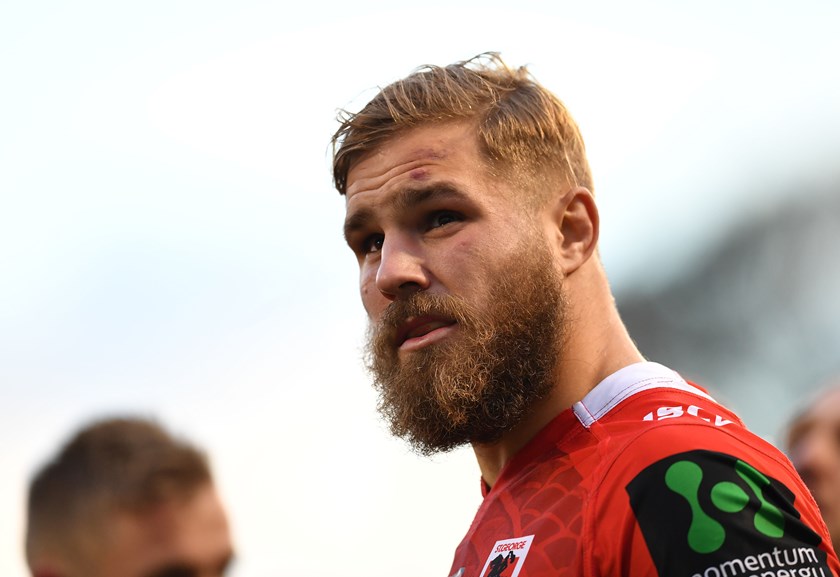 Dragons lock Jack de Belin.