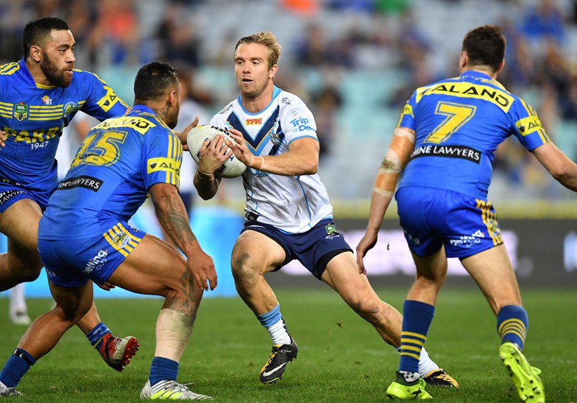 Gold Coast Titans five-eighth Kane Elgey takes on the Parramatta defence.