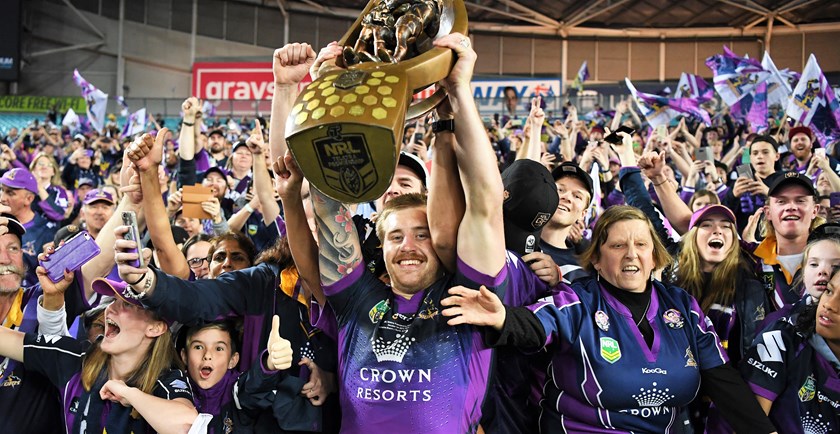 Cameron Munster celebrates Melbourne's 2017 grand final win.