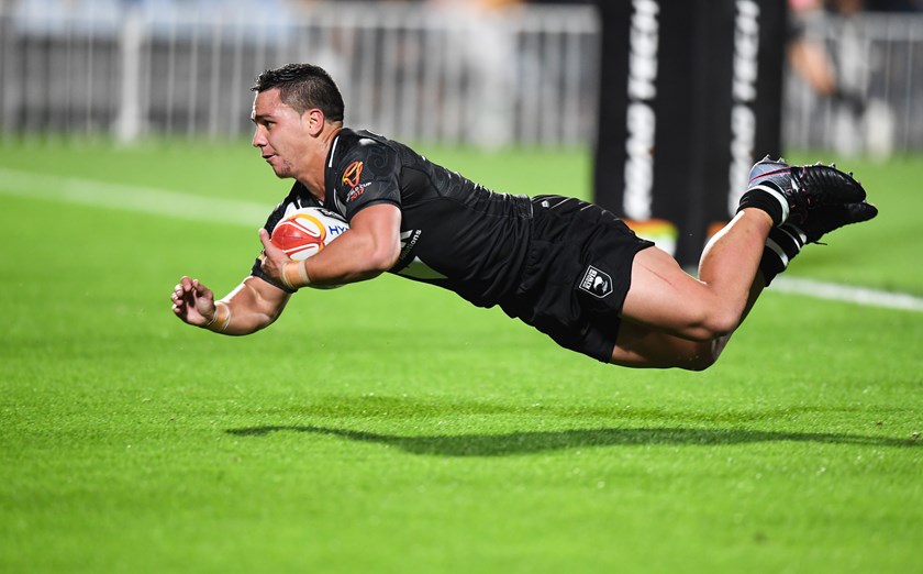 Kodi Nikorima scores for New Zealand at the 2017 World Cup.