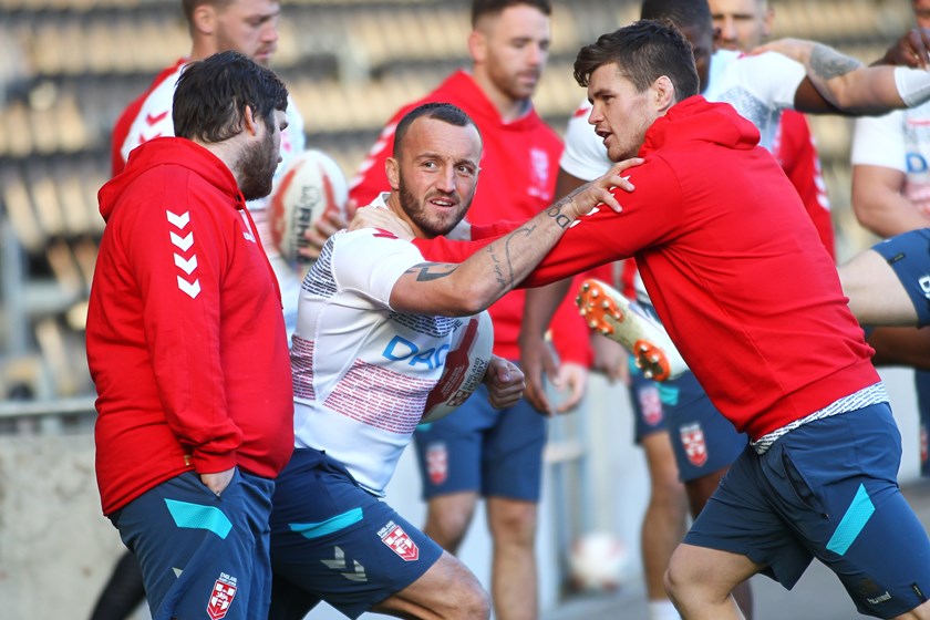 Josh Hodgson warms up at England training on Friday.