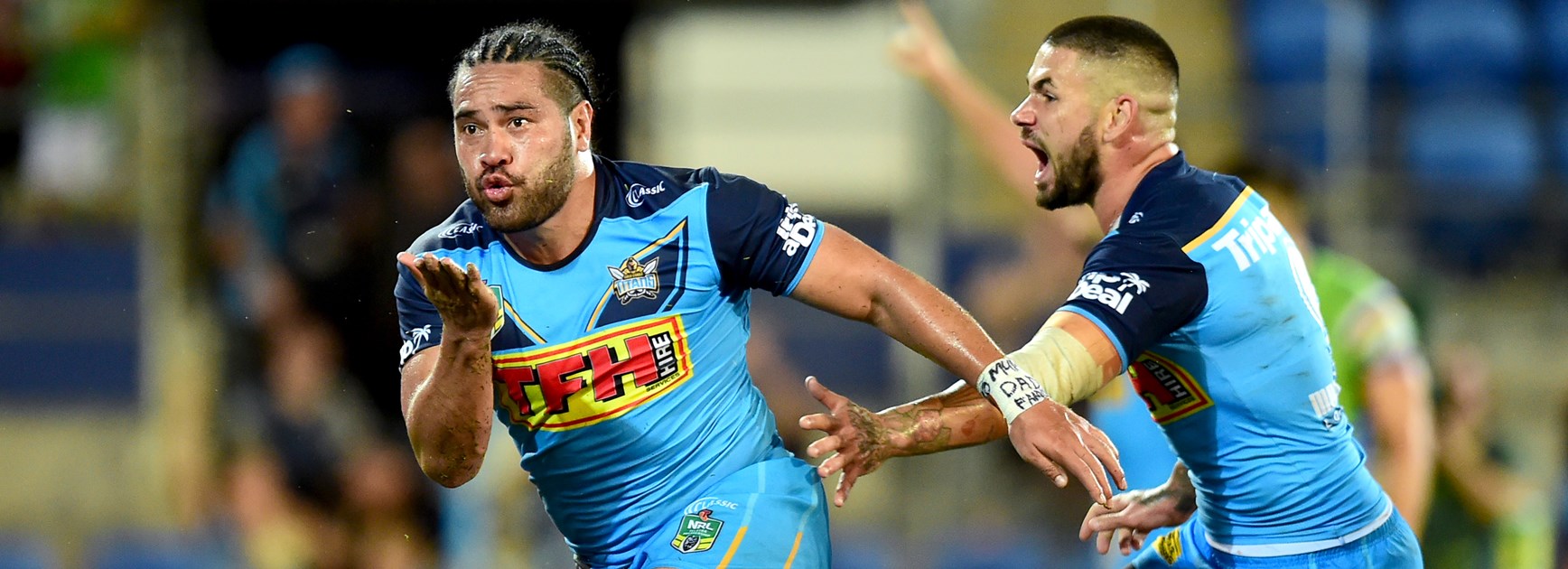 Konrad Hurrell celebrates a Titans try.