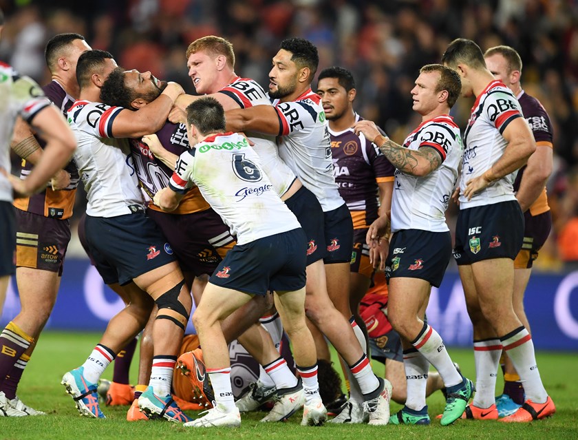 Dylan Napa and Sam Thaiday lock horns.