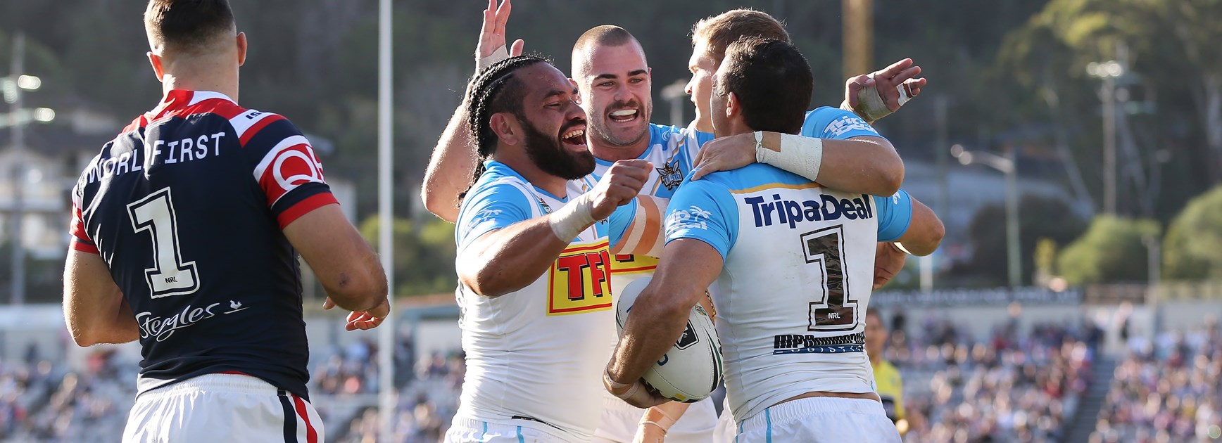 The Titans celebrate Michael Gordon's try.