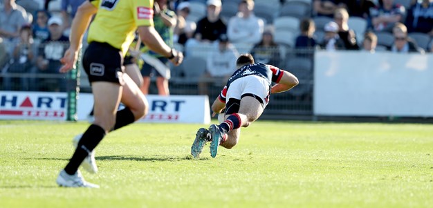 Second-half blitz helps Roosters swamp Titans