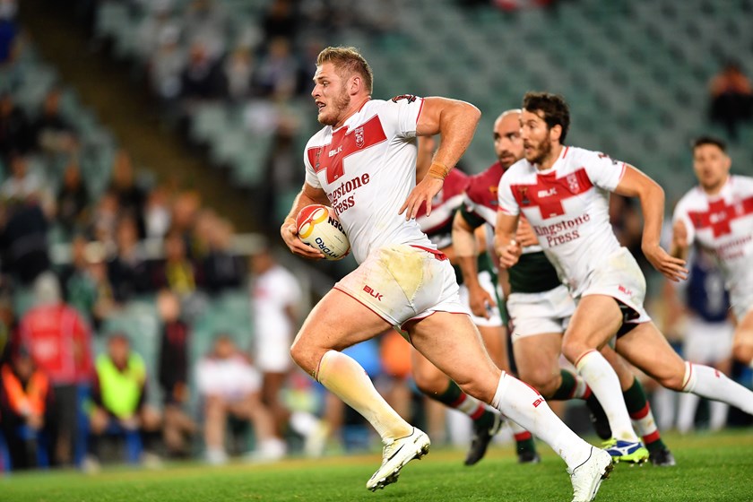 Tom Burgess in action for England.