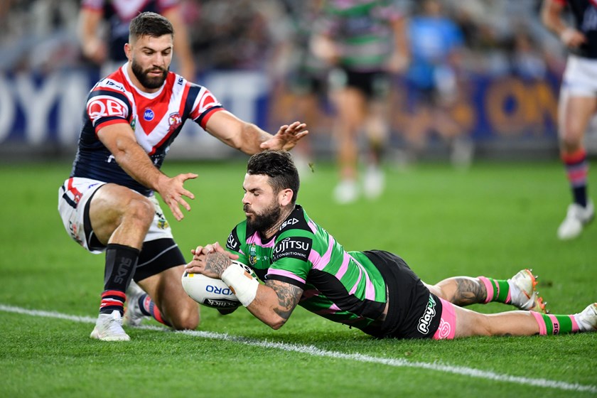 Adam Reynolds evades James Tedesco to score.