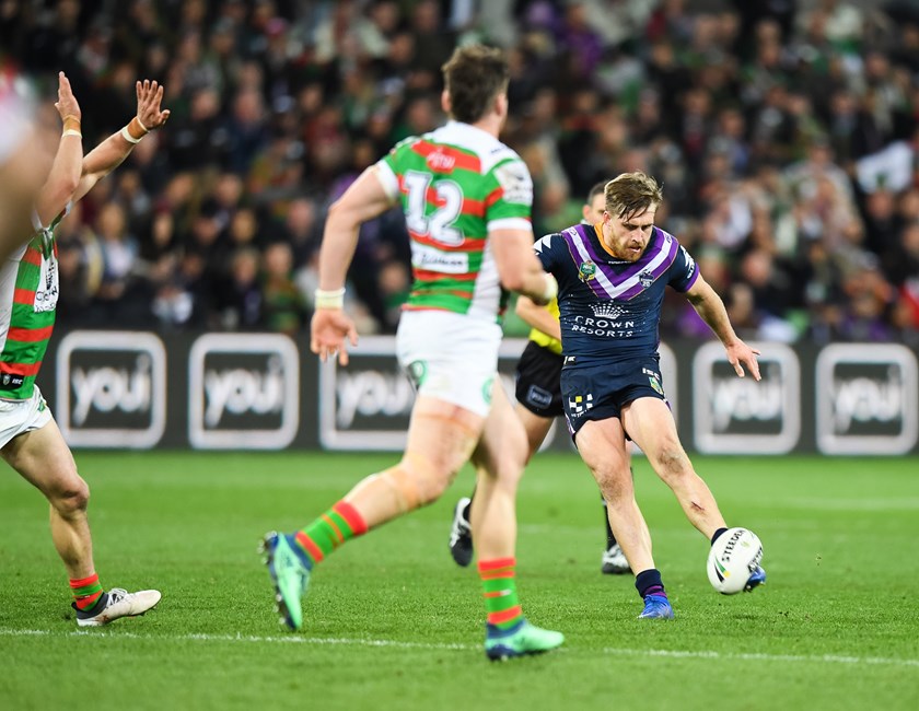 Storm five-eighth Cameron Munster kicks the match-winning field goal against Rabbitohs.