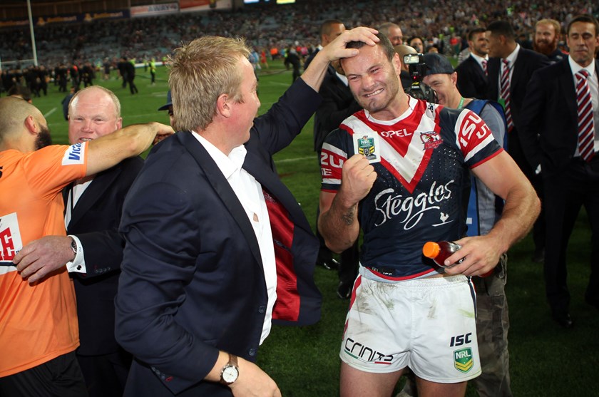 Trent Robinson congratulates Boyd Cordner after the 2013 premiership win.