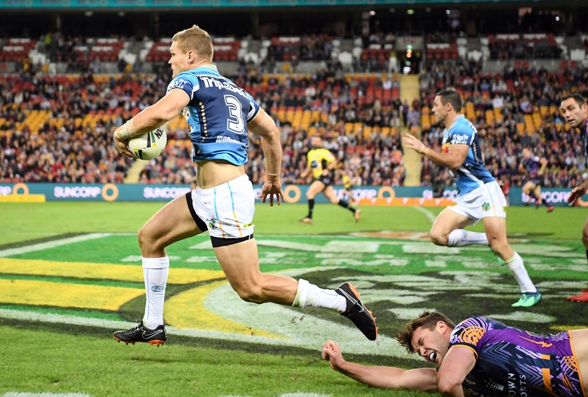 Titans centre Dale Copley surges down the field.