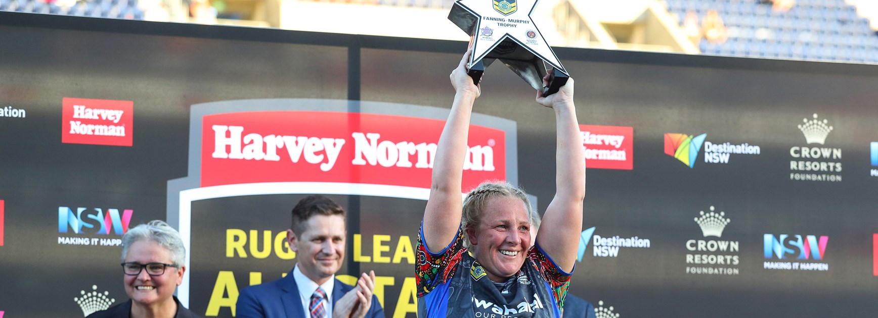 Indigenous Women's captain Bec Young with the 2017 All Stars trophy.