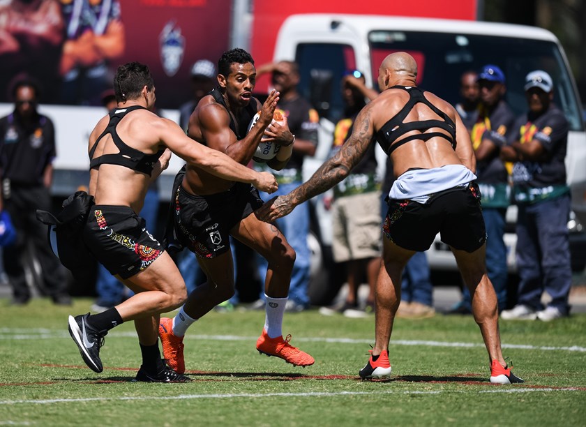 The Indigenous All Stars go through their paces.