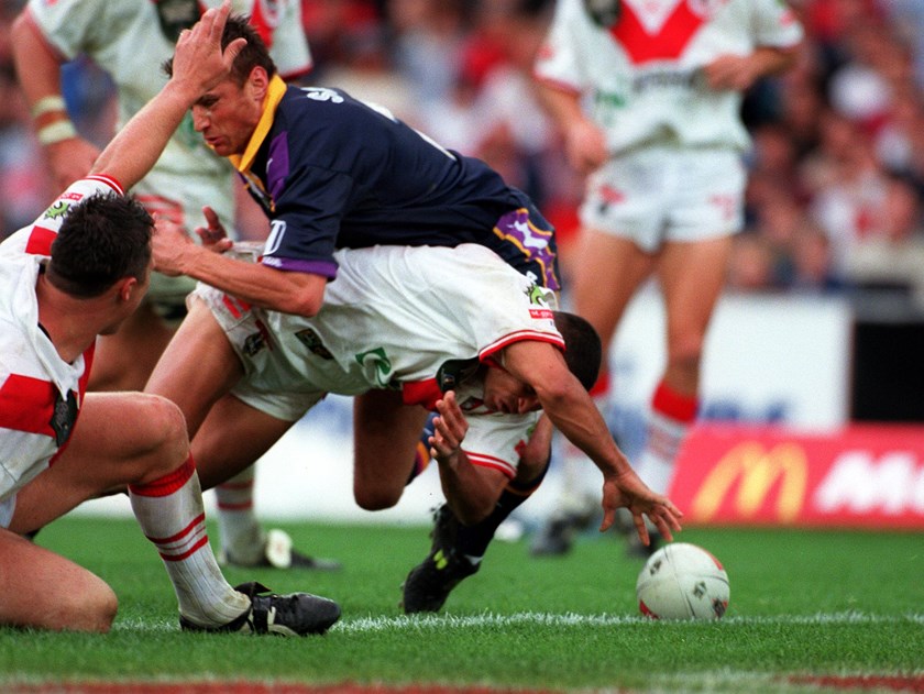 Anthony Mundine drops the ball over the line.