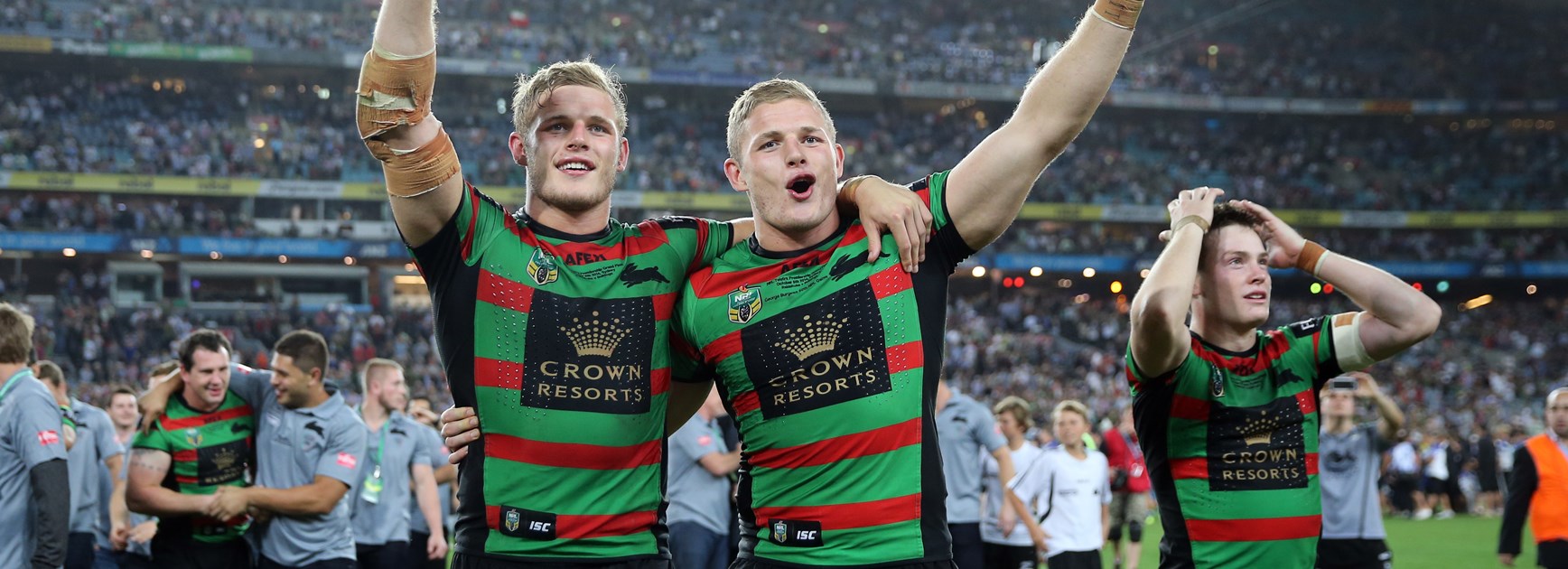 Twins George and Tom Burgess celebrate the Rabbitohs' 2014 premiership.