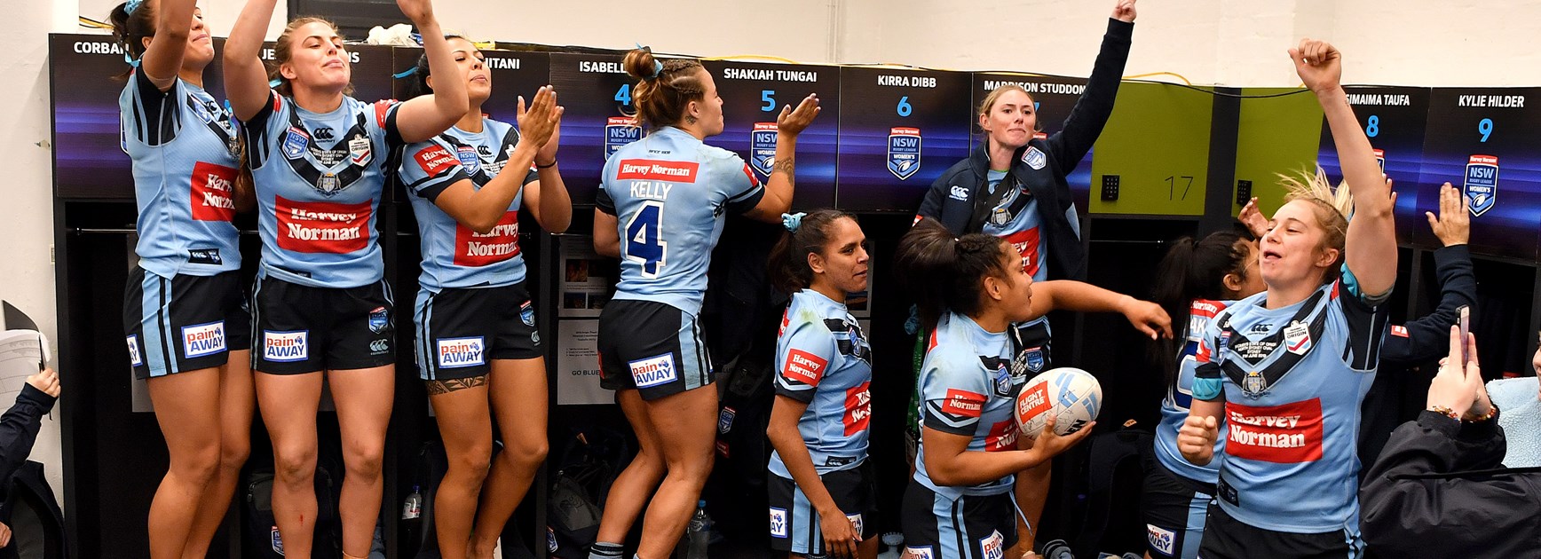 The Blues celebrate their 2019 Origin win at North Sydney Oval.