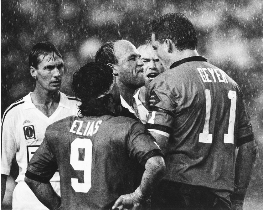 The iconic photo of Wally Lewis and Mark Geyer during their Origin II confrontation in 1991.