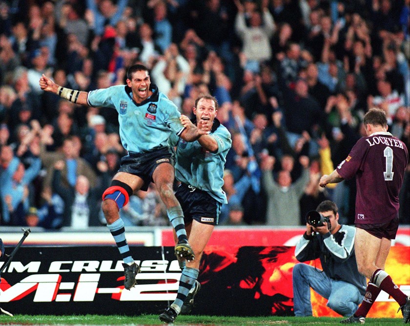 David Peachey and Jamie Ainscough celebrate after the NSW fullback's match-winning try in game one.