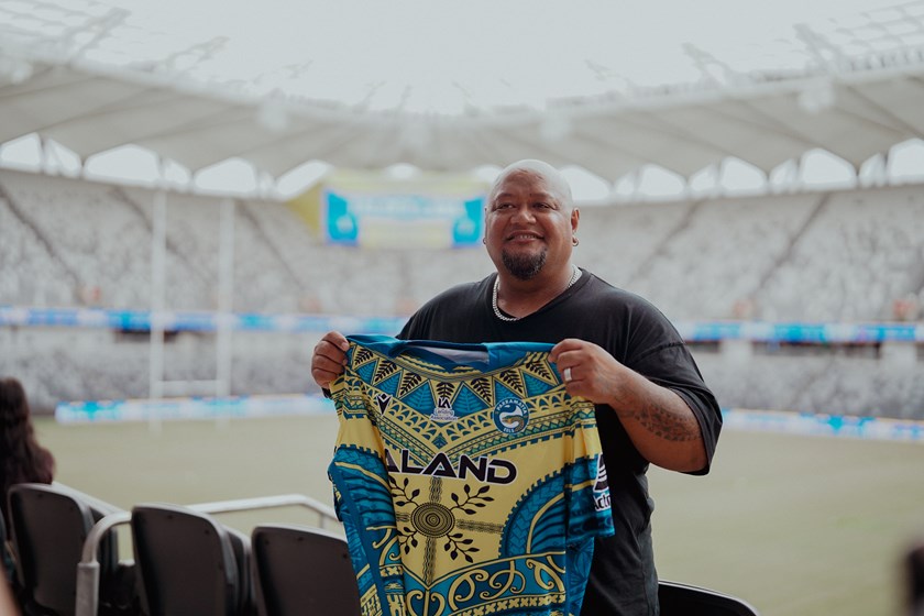 Tattoo artist Tavita Mose with his training designer jersey.