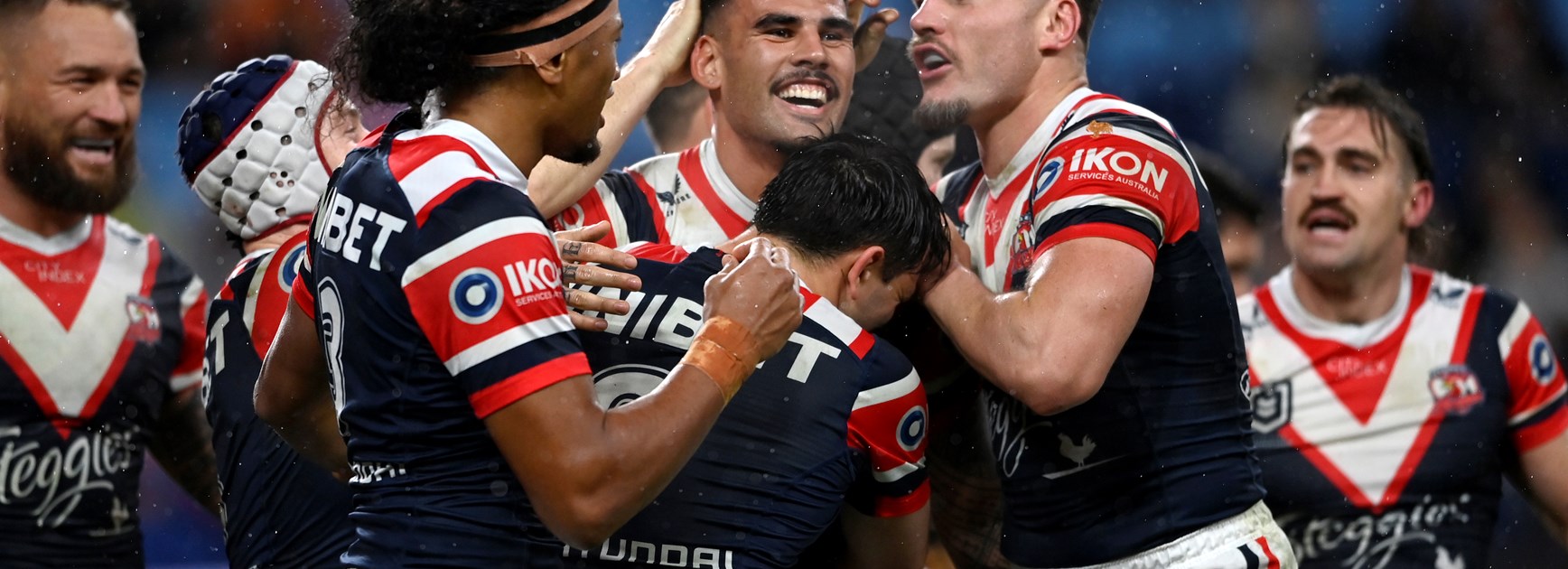 Roosters defy rain in big win over Wests Tigers