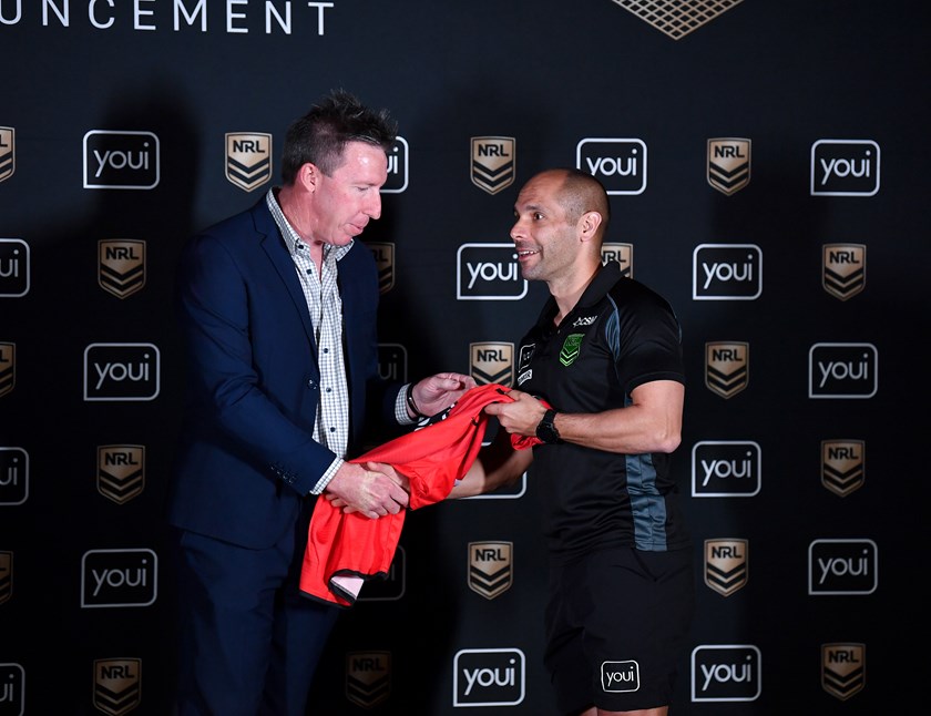 NRL GM - Elite Officiating Jared Maxwell presents Ashley Klein with his jersey before the 2022 grand final.