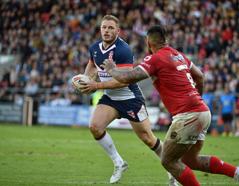 Rabbitohs prop Tom Burgess in action for England during last year's series against Tonga.