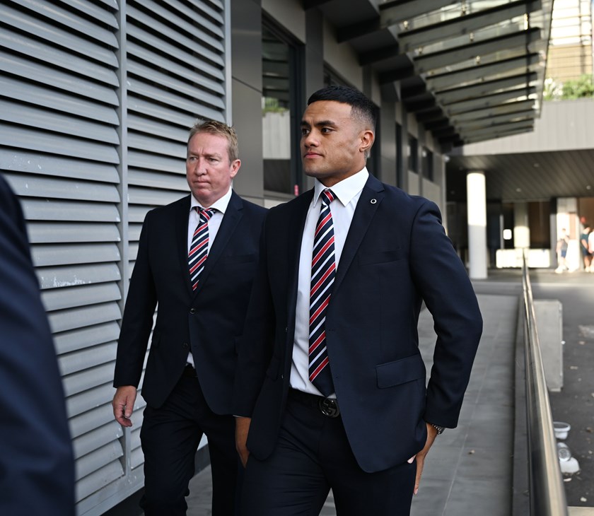 Spencer Leniu arrives at the NRL judiciary with Roosters coach Trent Robinson.