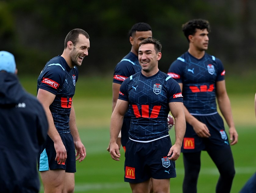 Blues brothers: Reece Robson and Isaah Yeo share a joke at NSW training