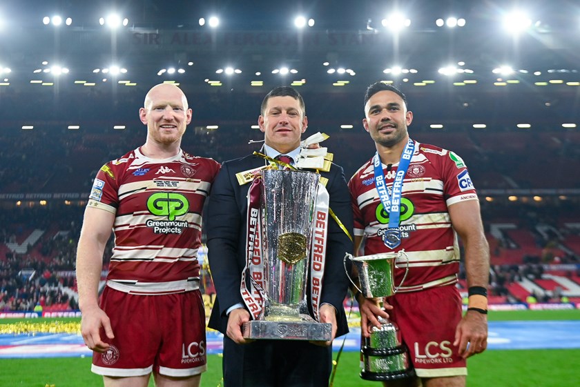 Wigan coach Matty Peet with Liam Farrell and Bevan French after the Super League decider.