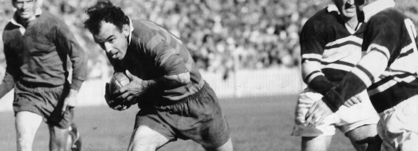 Clive Churchill playing for Souths against Wests in the 1950s.